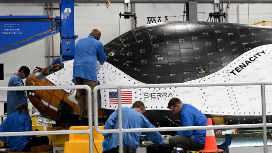Sierra Space technicians debug the 